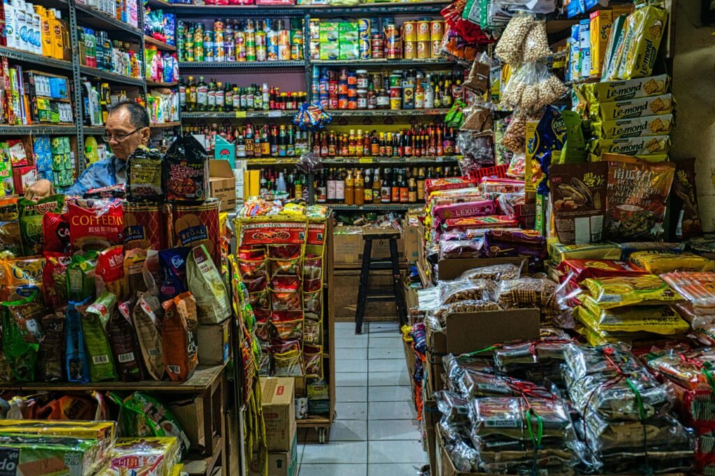 Bustling Banten market stall with diverse products and local merchant.